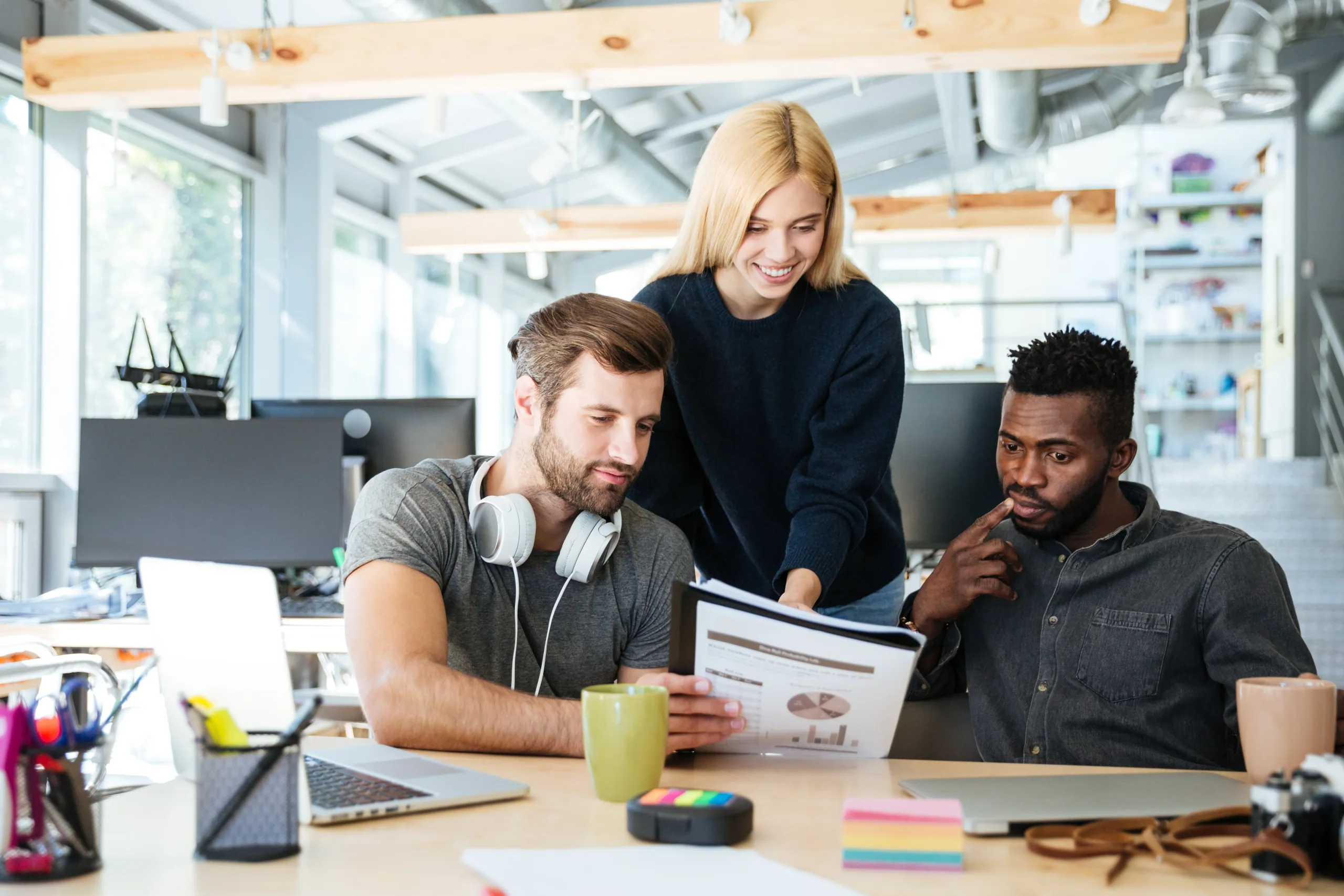 Digital product team collaborating in an office